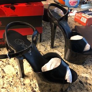 Black sexy pleaser heels.